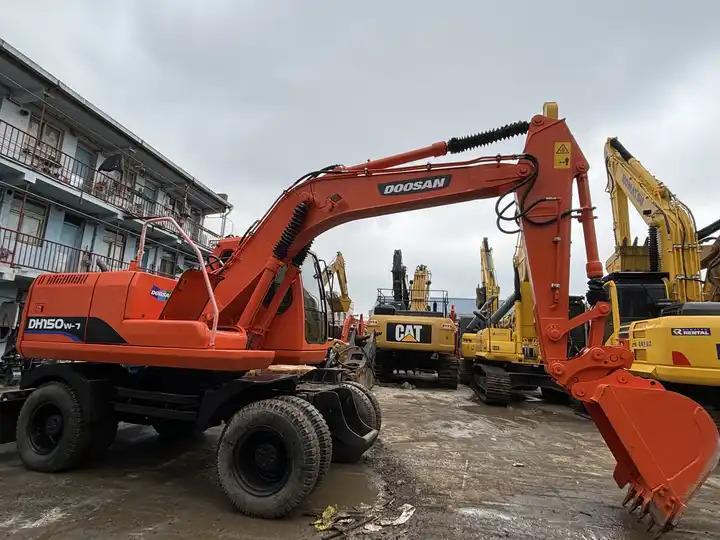 Wheel excavator 15ton Used Wheel Excavator Doosan Dh150w-7 Made In Korea For Sale With Original Good Running Condition In Shanghai 15ton Used Wheel Excavator Doosan Dh150w-7 Made In Korea For Sale With Original Good Running Condition In Shanghai- Photo 2