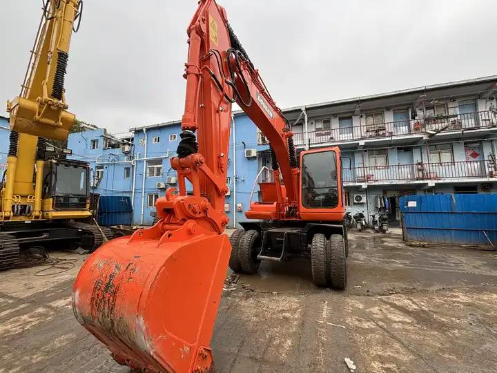 Wheel excavator 15ton Used Wheel Excavator Doosan Dh150w-7 Made In Korea For Sale With Original Good Running Condition In Shanghai 15ton Used Wheel Excavator Doosan Dh150w-7 Made In Korea For Sale With Original Good Running Condition In Shanghai- Photo 3