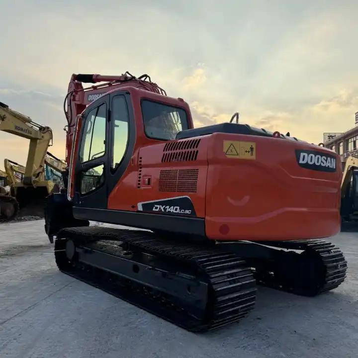 Escavatore cingolato Doosan Dx140 Used Excavator DX140LC-9C Min Excavator Crawler Equipment Machinery Dx60 Dx80 Dx140LC Dx225 Dx300LC Dh60 Dx55 Doosan Dx140 Used Excavator DX140LC-9C Min Excavator Crawler Equipment Machinery Dx60 Dx80 Dx140LC Dx225 Dx300LC Dh60 Dx55- Photo 3
